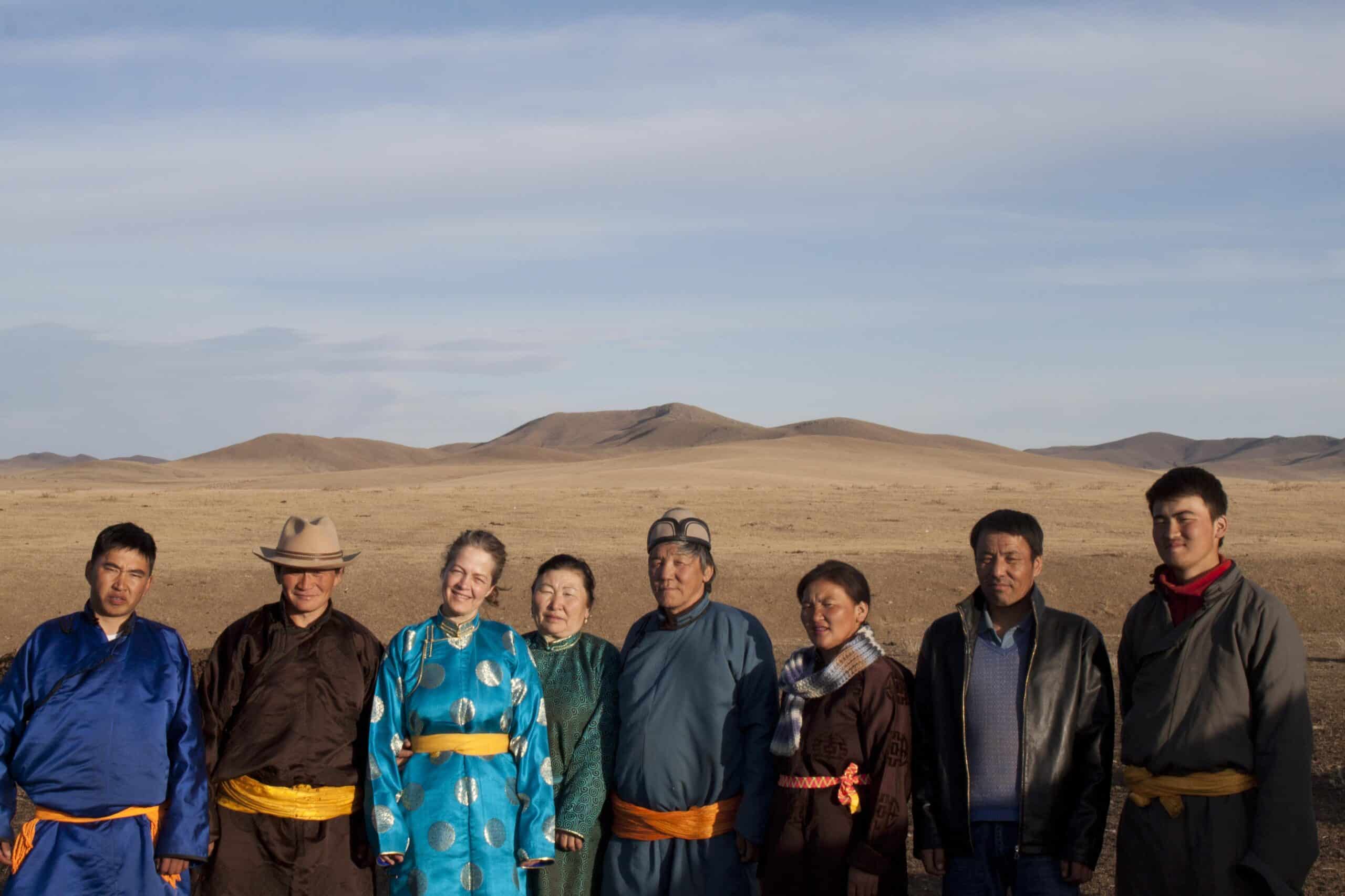 Host family in Mongolia enjoys cultural exchange with our volunteers.  A volunteer takes a group photo with her host family in Mongolia during her cultural exchange program.