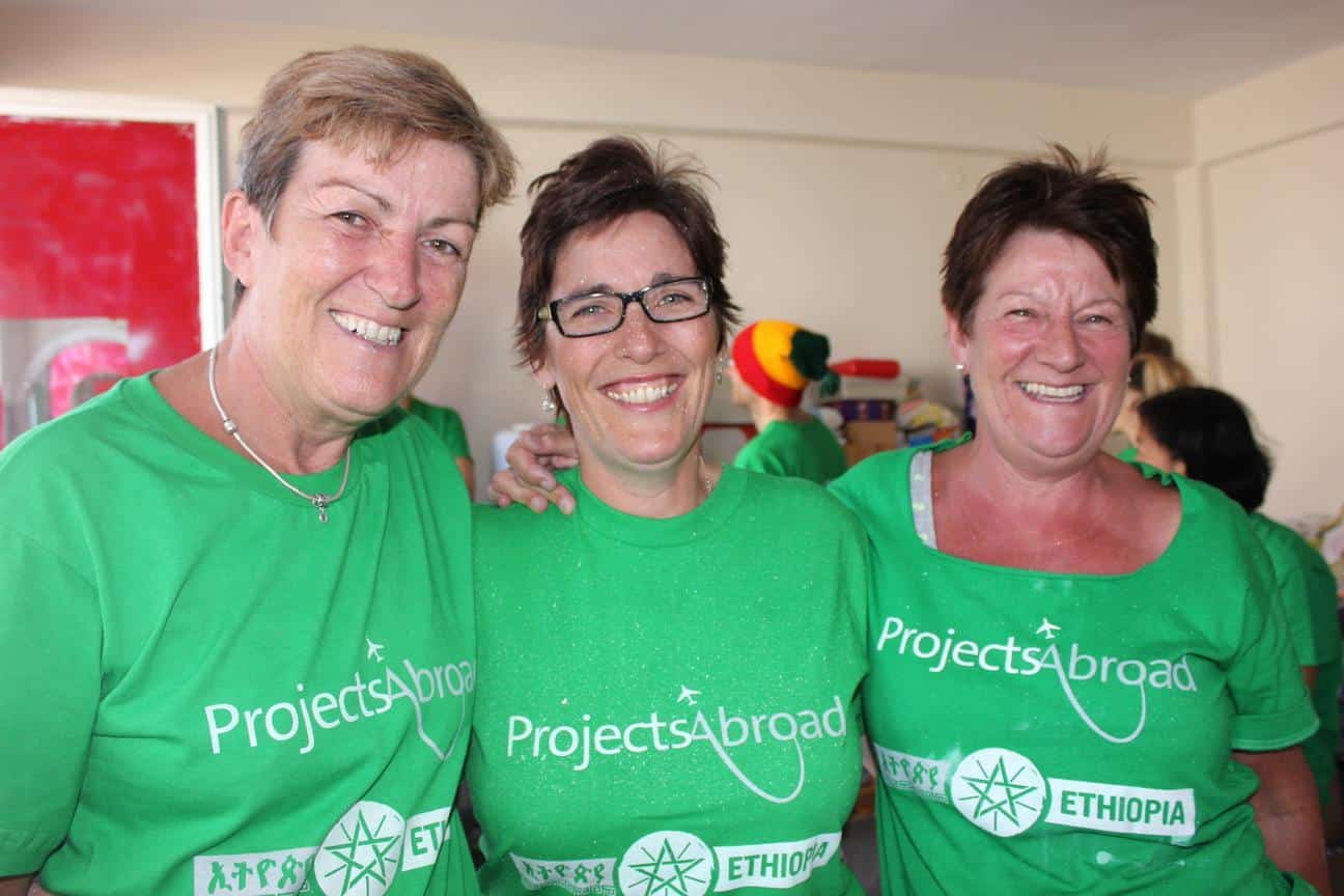 Projects Abroad volunteers take a group photo during a senior volunteer vacation