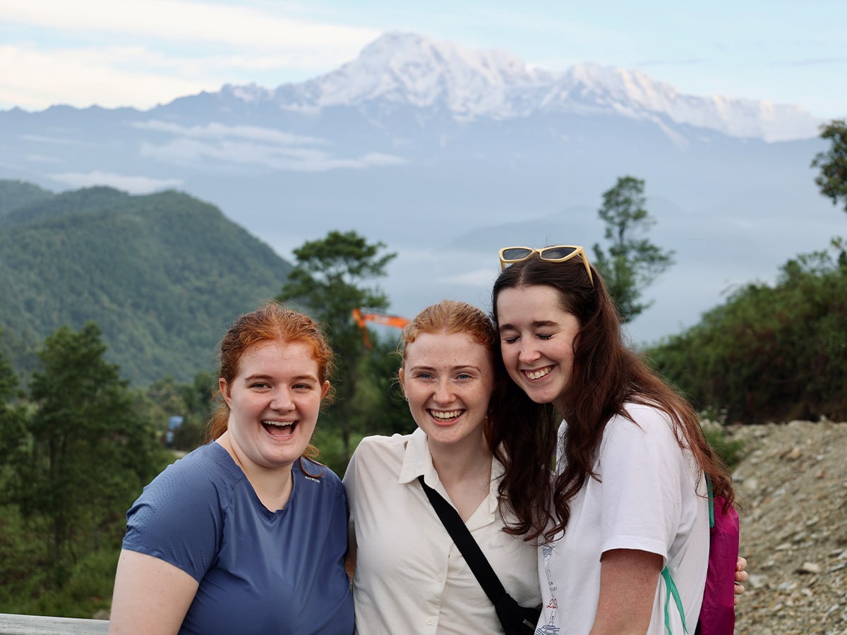 3 Ladies Smiling at Nepal Mountain Viewpoint