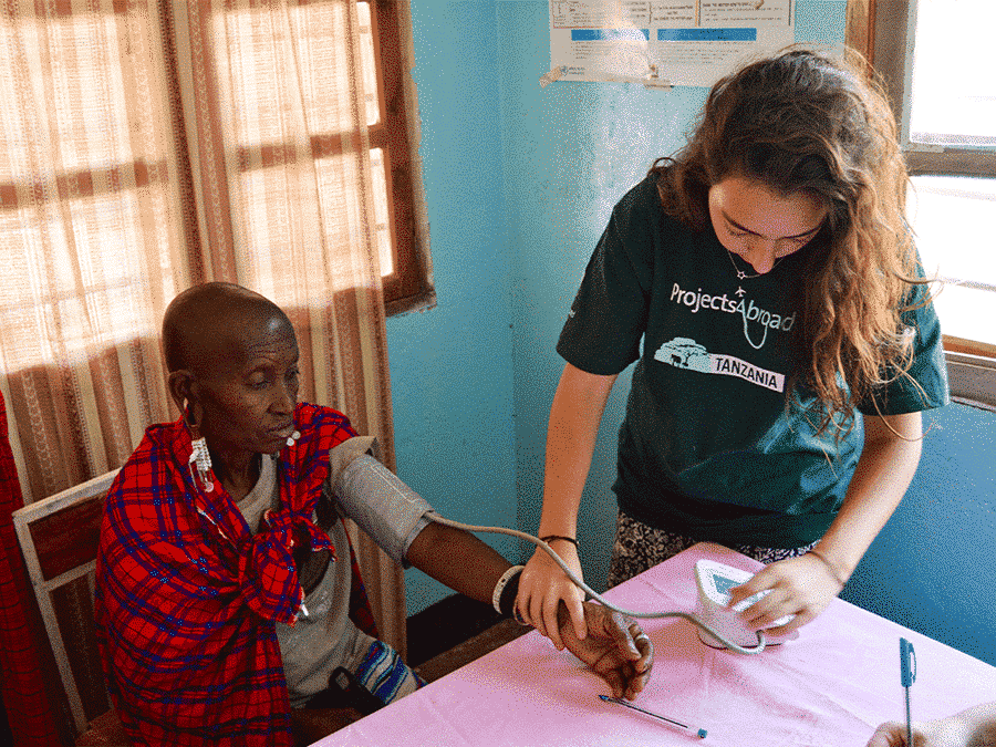 public health intern, assisting health screening in Tanzania