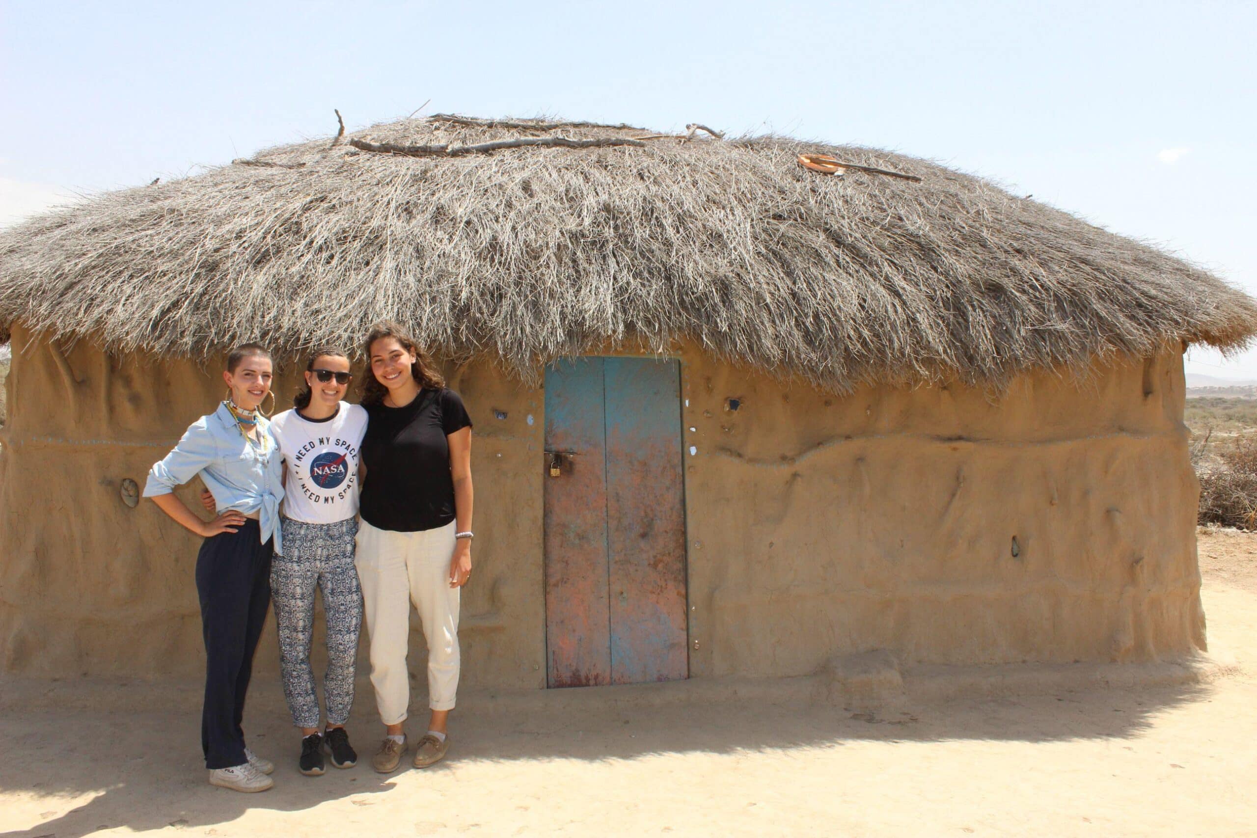 A group of gap semester students experience cultural immersion in a Maasai village in Tanzania, East Africa.