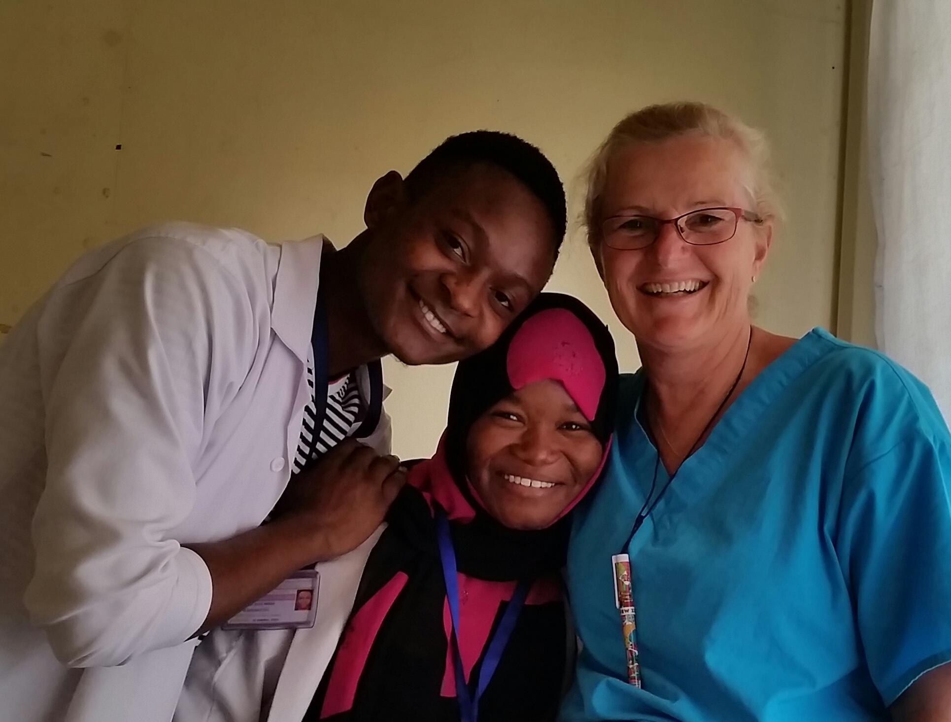 Australian intern on a nursing internship in Tanzania with Proejcts Abroad takes a photo with colleagues during her work experience.