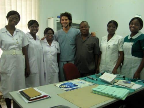 An intern on a Dentistry Project in Ghana with local medical staff at a clinic.