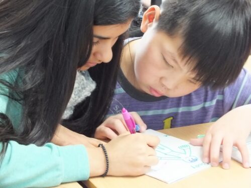 An intern working with a child during her Social Work internship in Mongolia