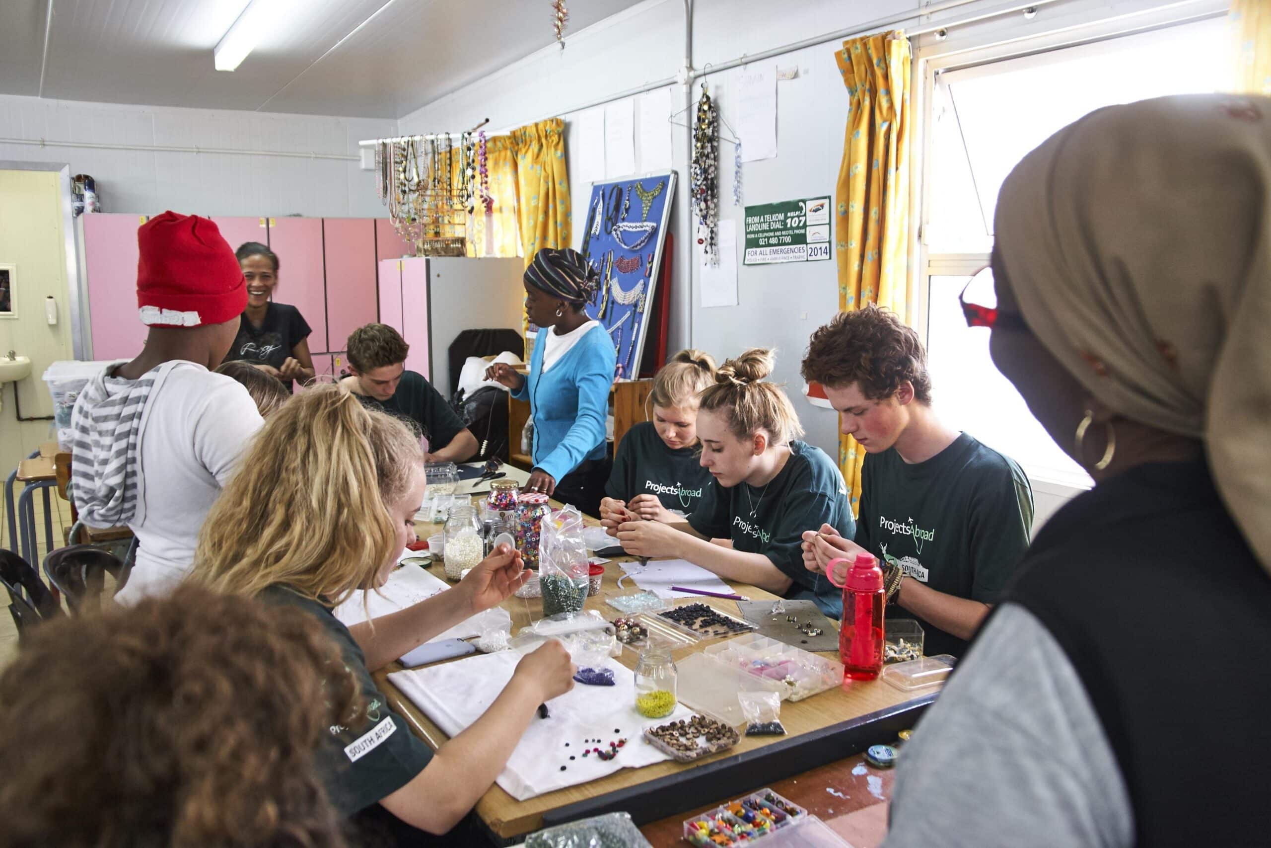 International Development interns work with businesswomen to support a local community during an internship project in South Africa.