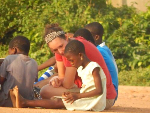 A Projects Abroad intern gains social work experience in Ghana by working through activities with a child.