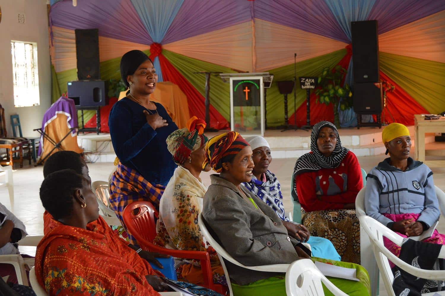 Local women attend a training session hosted by women’s empowerment volunteers in Tanzania.