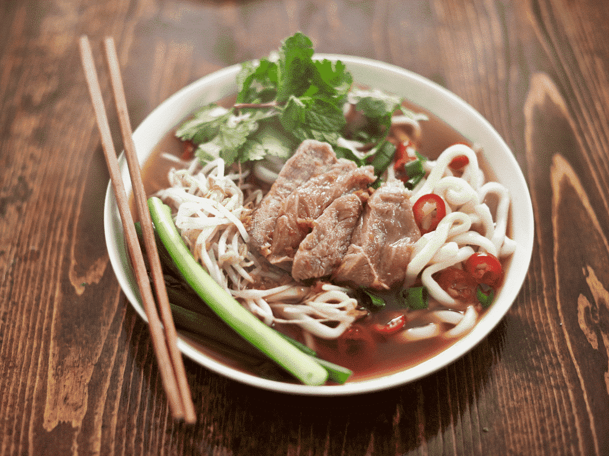 Phở, a traditional soup dish of broth, noodles, herbs and meat