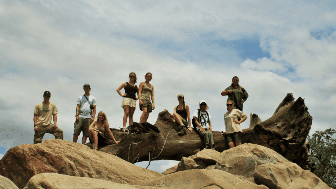 Our teen volunteers gather for a group photo on the reserve