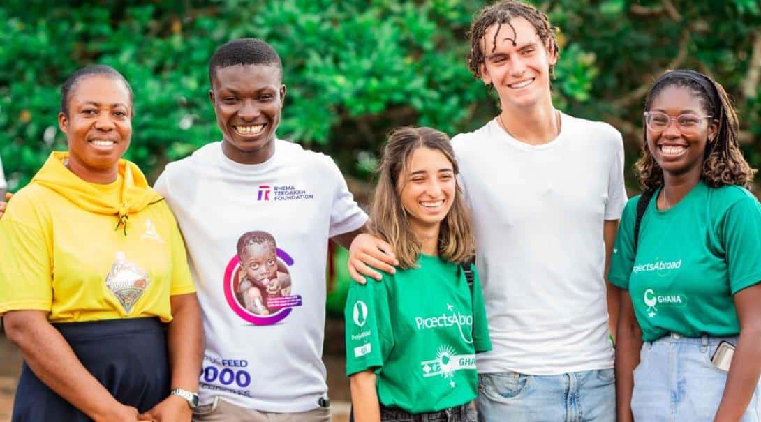 Volunteers with locals in Ghana